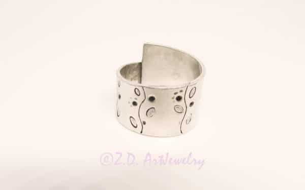 Sterling silver ring with chased details