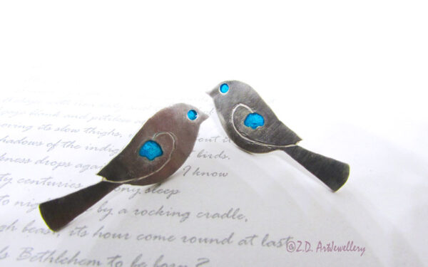 blue-eyed bird earrings