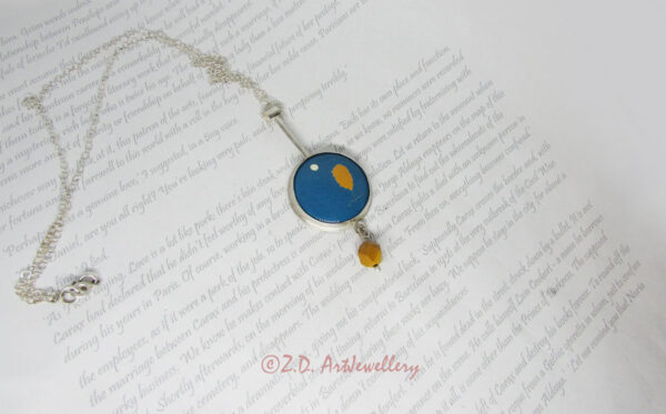 enamel sun and tree necklace