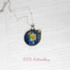 bird and lantern enamel pendant